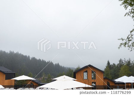 view of the mountains and a wooden house 118776299