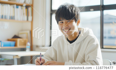 Boys studying to study 118776477