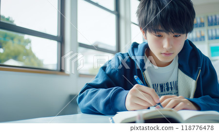Boys studying to study 118776478