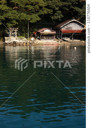 Seaside shrine torii gate and boathouse composition 118776804