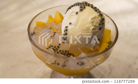 Ice mango nata de coco ice cream dessert with chia seed toppings. 118777289