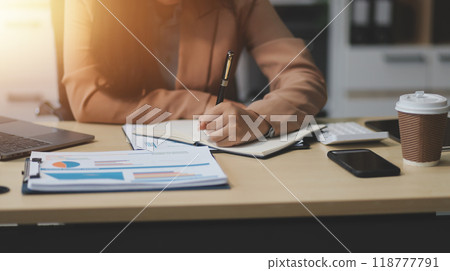 business documents businessman check legal document review Prepare documents or analysis reports, tax items, accounting documents, data contracts, office partner agreements. 118777791