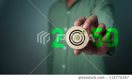 Carbon reduction and carbon credit to limit global warming from climate change, Businessman showing to CO2 reduction symbol by 2050, Bio Circular Green Economy concept, Greenhouse gas, Net zero. Carbon reduction and carbon credit to limit global warming from climate change, Businessman showing to CO2 reduction symbol by 2050, Bio Circular Green Economy concept, Greenhouse gas, Net zero. 118778367
