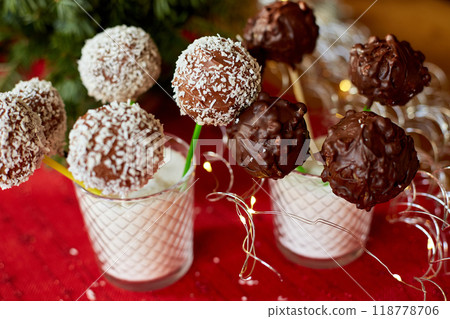 Assorted Chocolate Cake Pops Decorated With Coconut in a Glass at a Festive Event 118778706