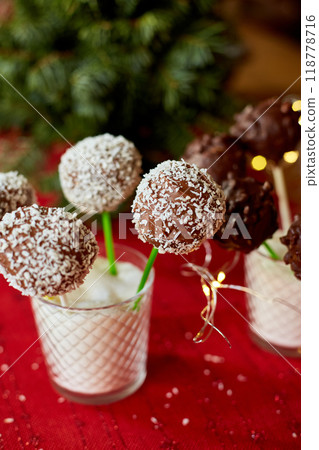 Assorted Chocolate Cake Pops Decorated With Coconut in a Glass at a Festive Event 118778716