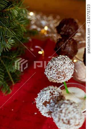 Assorted Chocolate Cake Pops Decorated With Coconut in a Glass at a Festive Event 118778723