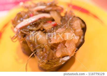 Fresh sushi from a conveyor belt sushi restaurant - Matsumaezuke gunkan Fresh sushi from a conveyor belt sushi restaurant - Matsumaezuke gunkan 118779129