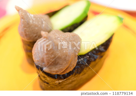 Fresh sushi at conveyor belt sushi - Crab miso Fresh sushi at conveyor belt sushi - Crab miso 118779134