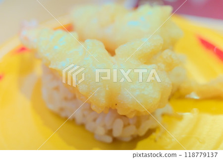 Fresh sushi at conveyor belt sushi - fried shrimp Fresh sushi at conveyor belt sushi - fried shrimp 118779137