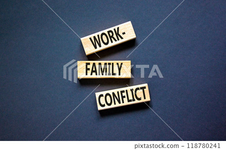 Work-family conflict symbol. Concept words Work-family conflict on wooden block on a beautiful black table black background. Business work-family conflict concept. Copy space. Work-family conflict symbol. Concept words Work-family conflict on wooden block on a beautiful black table black background. Business work-family conflict concept. Copy space. 118780241