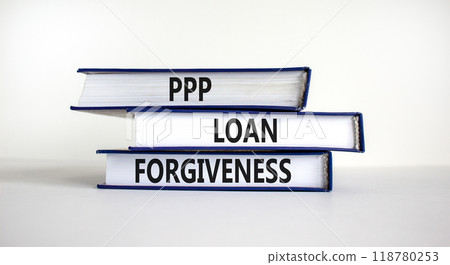 PPP, paycheck protection program loan forgiveness. Concept words PPP loan forgiveness on books on white background. Business, PPP - paycheck protection program loan forgiveness concept. 118780253