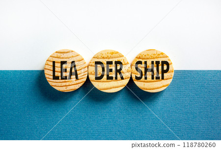 Leadership symbol. Concept word Leadership on beautiful wooden circles. Beautiful blue white background. Business leadership concept. Copy space. Leadership symbol. Concept word Leadership on beautiful wooden circles. Beautiful blue white background. Business leadership concept. Copy space. 118780260