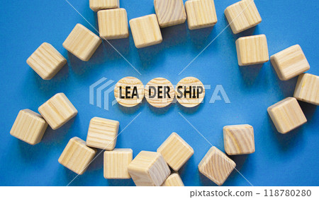 Leadership symbol. Concept word Leadership on beautiful wooden circles. Beautiful blue table blue background. Wooden cubes. Business leadership concept. Copy space. Leadership symbol. Concept word Leadership on beautiful wooden circles. Beautiful blue table blue background. Wooden cubes. Business leadership concept. Copy space. 118780280