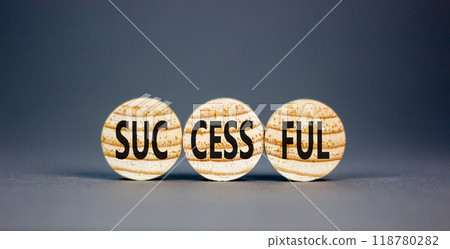 Successful symbol. Concept word Successful on beautiful wooden circles. Beautiful grey table grey background. Business successful concept. Copy space. Successful symbol. Concept word Successful on beautiful wooden circles. Beautiful grey table grey background. Business successful concept. Copy space. 118780282
