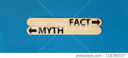 Fact or myth symbol. Concept word Myth and Fact on beautiful wooden stick. Beautiful blue table blue background. Business and fact or myth concept. Copy space. 118780357