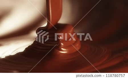 Macro Shot of Pouring Hot Melted Chocolate in Close-up. Macro Shot of Pouring Hot Melted Chocolate in Close-up. 118780757