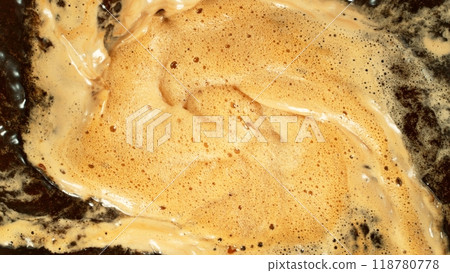Macro Shot of Foam Mixing with Coffee Drink in Detail. Macro Shot of Foam Mixing with Coffee Drink in Detail. 118780778