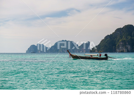 Tourist people on wood boat sailing at Phi Phi Don island, Krabi Tourist people on wood boat sailing at Phi Phi Don island, Krabi 118780860