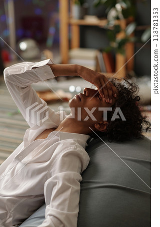 Teenage guy with splitting headache Teenage guy with splitting headache 118781353
