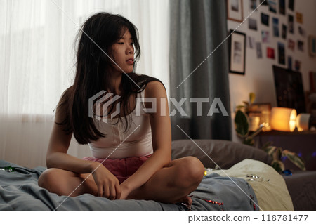 Asian girl suffering from hangover 118781477