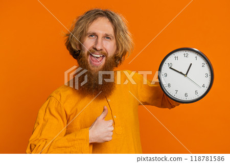 Excited Caucasian man showing time hour on wall office clock ok thumb up approve hurry up deadline 118781586