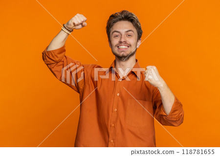 Happy Caucasian man celebrating success winning birthday lottery jackpot goal achievement good news 118781655