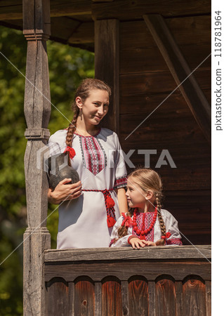 mother and daughter dressed in Ukrainian national costumes mother and daughter dressed in Ukrainian national costumes 118781964