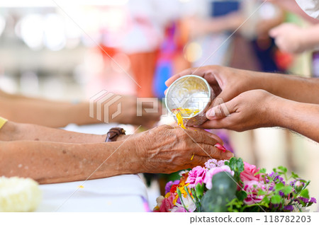 Thai New Year celebration, Rot Nam Dam Hua, traditional celebration of elders. Songkran ceremony. Thai New Year celebration, Rot Nam Dam Hua, traditional celebration of elders. Songkran ceremony. 118782203
