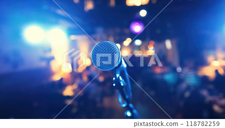 Microphone on stage against a background of auditorium. Microphone on stage against a background of auditorium. 118782259