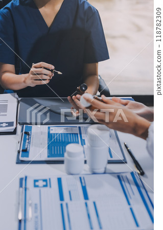 international team of professional doctors having a meeting in conference room at the modern hospital. Healthcare and medical development concept. international team of professional doctors having a meeting in conference room at the modern hospital. Healthcare and medical development concept. 118782309