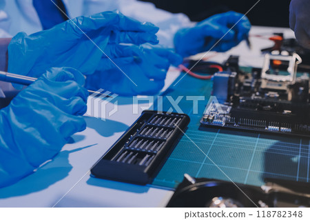 Electronics technician, electronic engineering electronic repair, electronics measuring and testing, repair and maintenance concepts. Electronics technician, electronic engineering electronic repair, electronics measuring and testing, repair and maintenance concepts. 118782348