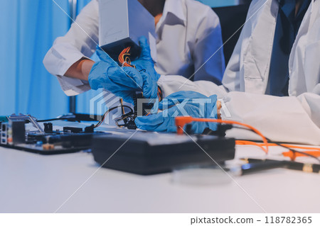 Electronics technician, electronic engineering electronic repair, electronics measuring and testing, repair and maintenance concepts. Electronics technician, electronic engineering electronic repair, electronics measuring and testing, repair and maintenance concepts. 118782365