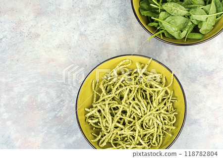 Homemade spinach pasta. Homemade spinach pasta. 118782804