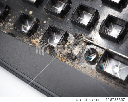 Keyboard with lots of dust Keyboard with lots of dust 118782867