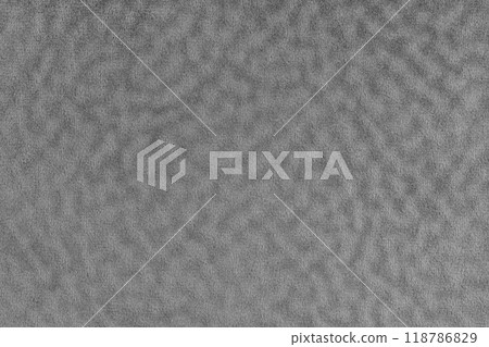 Faux fur texture with wavy effect, fluffy velours gray fabric or cloth, upholstery textile 118786829