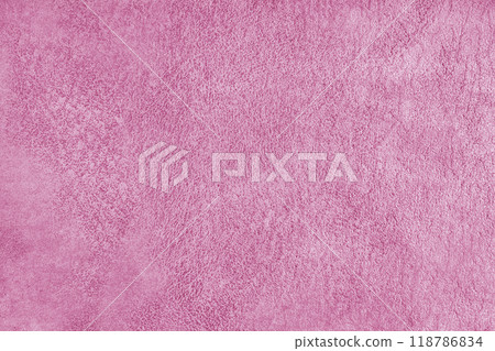 Pink suede leather texture with embossed pattern background, fleecy cloth texutre macro 118786834