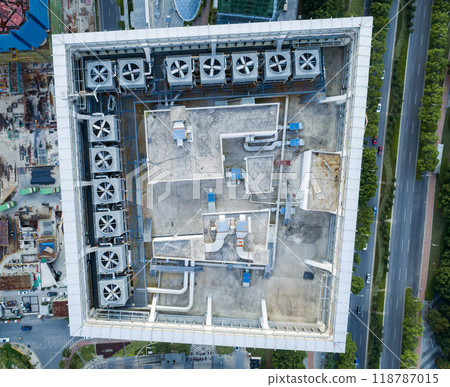 Aerial view of a commercial building rooftop with industrial air conditioning units Aerial view of a commercial building rooftop with industrial air conditioning units 118787015