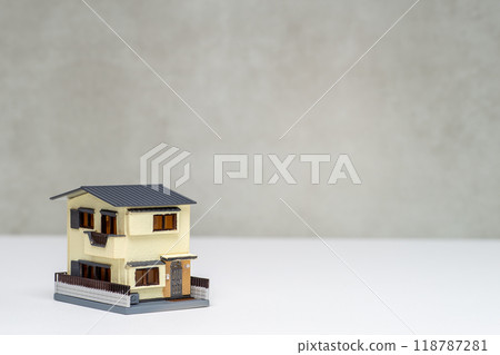 Miniature wooden house with gable roof 118787281
