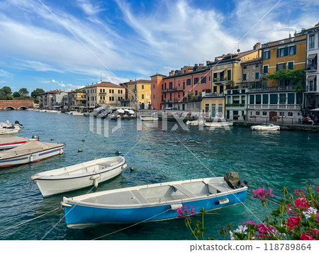 Sunset view of main canal in Italian town Peschiera del Garda. 118789864
