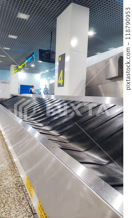 Close up of baggage conveyor belt at airport. Air travel concept Close up of baggage conveyor belt at airport. Air travel concept 118790953