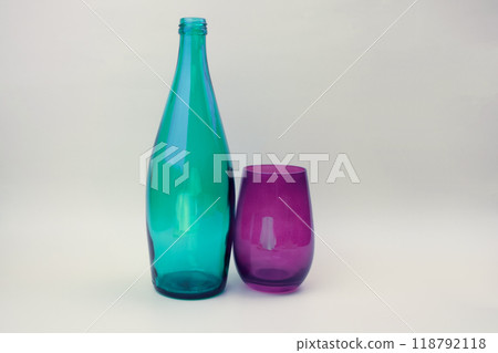 Colorful glass bottle and empty glass background Colorful glass bottle and empty glass background 118792118