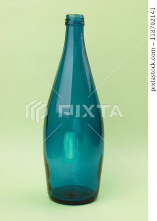 Colorful glass bottle, unusual background Colorful glass bottle, unusual background 118792141