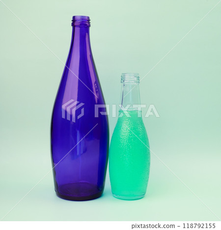 Colorful glass bottle, unusual background 118792155