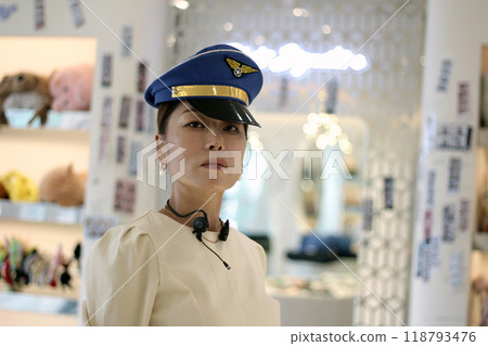 30s business woman posing as a business woman in studio 118793476