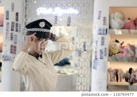 30s business woman posing as a business woman in studio 118793477