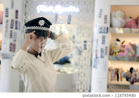 30s business woman posing as a business woman in studio 118793480