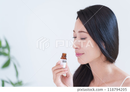 A woman with aromatic oil A woman with aromatic oil 118794205