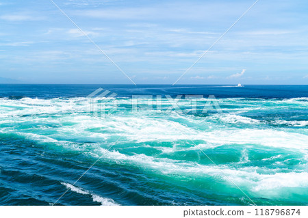 The whirlpools of the Naruto Strait. A tourist image of Awaji Island. 118796874