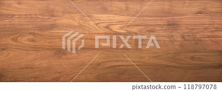 Background image of a horizontal board of brown walnut wood grain 118797078