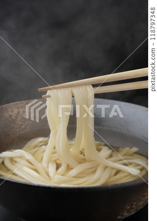 Lift udon with chopsticks Lift udon with chopsticks 118797348